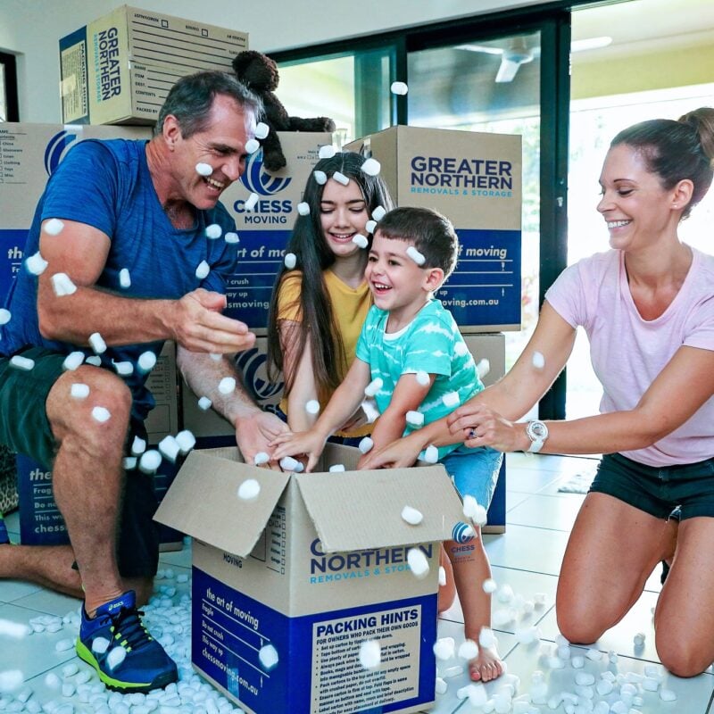 Cairns family moving into home with boxes from Greater Northern Removals