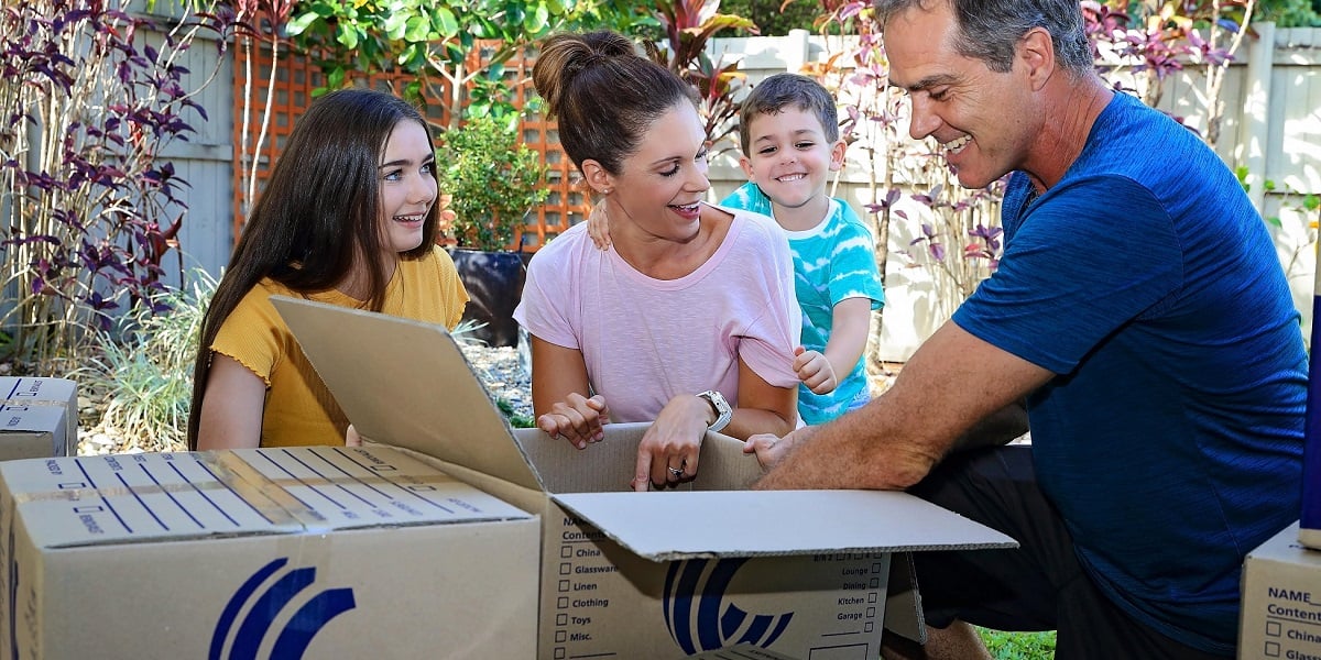 Cairns and Townsville Home Removals - Family unpacking in new home