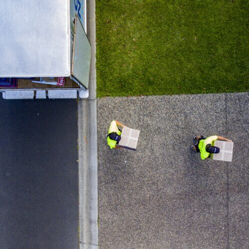 Removalists delivering boxes from truck